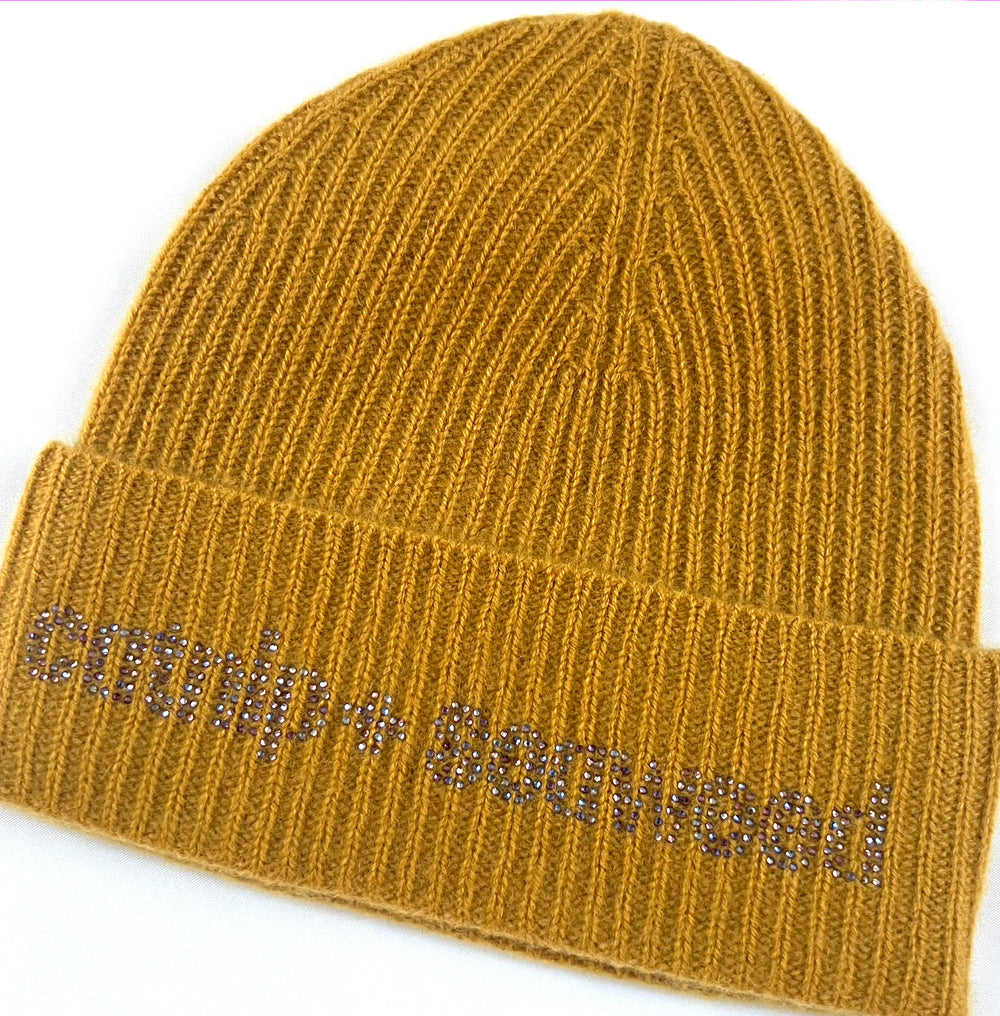 orange beanie with pink rhinestones
